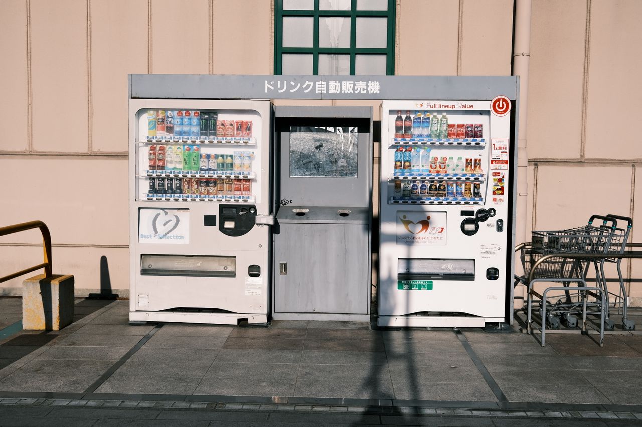 about-03 Vending machines in Gamagōri, Japan offer diverse drinks in a city setting.